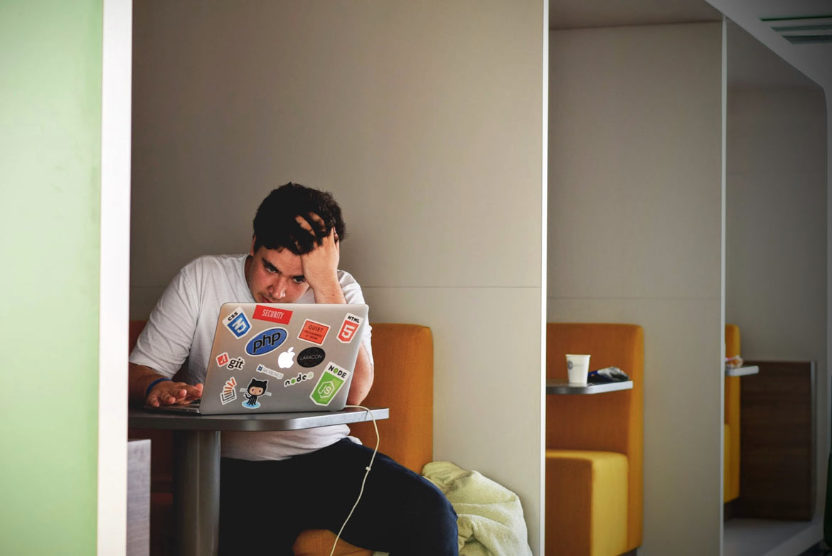 Man thinking about his bartender cover letter